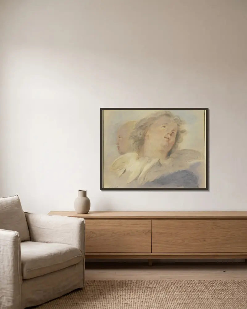 Zwei Engelsköpfe von Jacob de Wit gerahmt an einer Wand