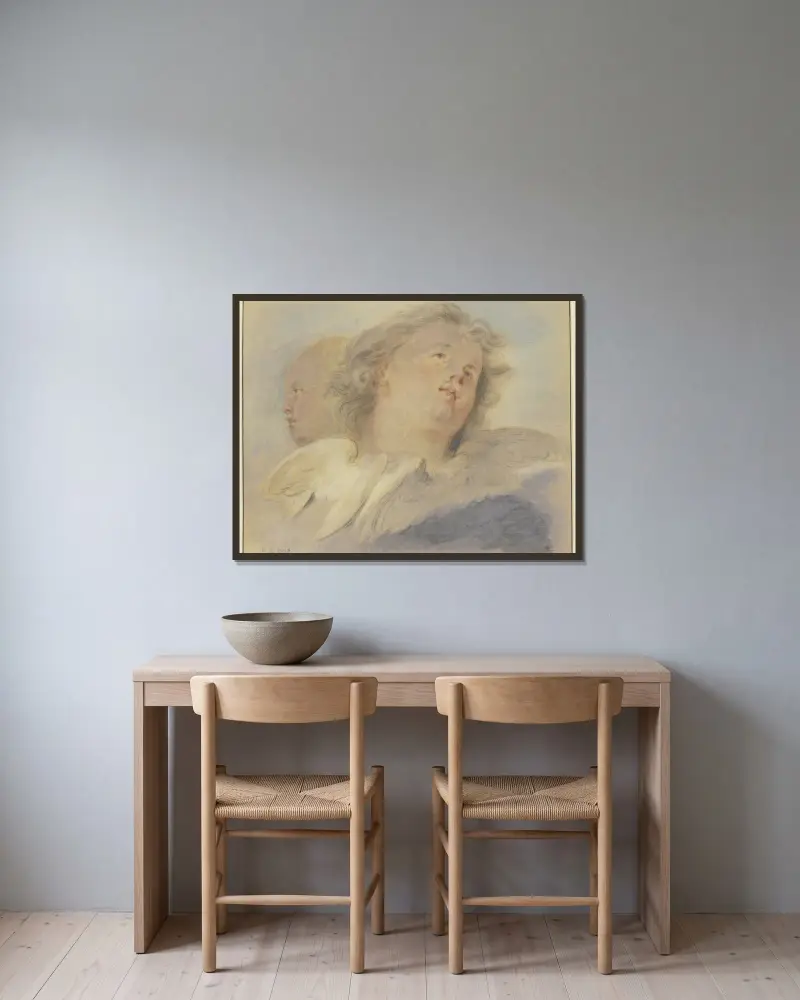 Zwei Engelsköpfe von Jacob de Wit gerahmt an einer Wand