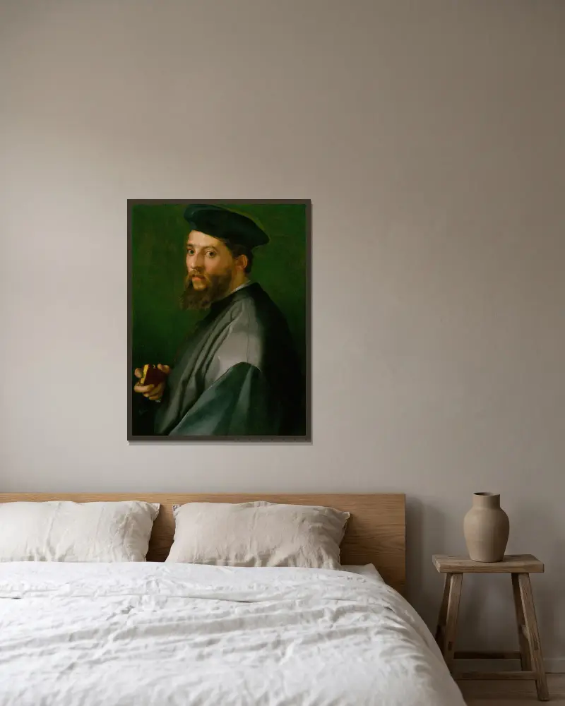 Porträtt av en man av Andrea del Sarto inramad på en vägg