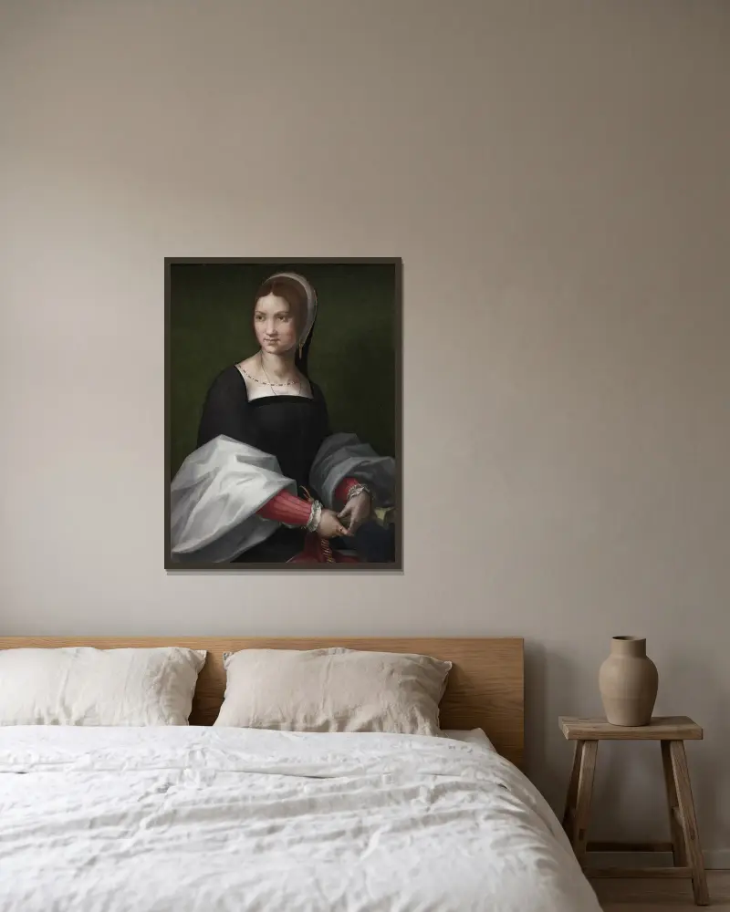 Porträtt av en kvinna av Andrea del Sarto inramad på en vägg