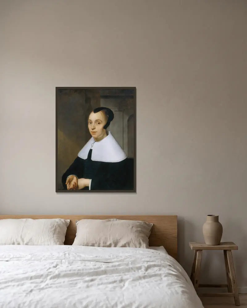 Porträtt av en kvinna, 1656 av Bartholomeus van der Helst inramad på en vägg