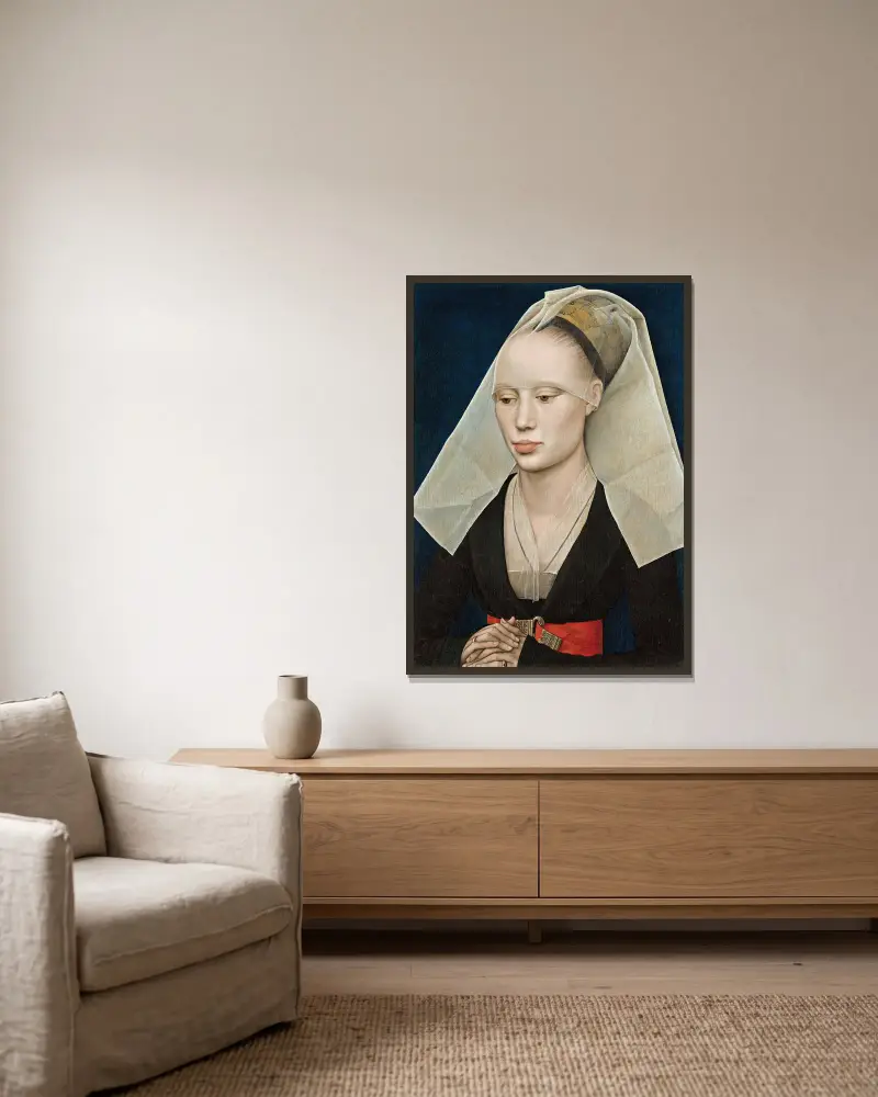 Bildnis einer Dame von Rogier van der Weyden gerahmt an einer Wand