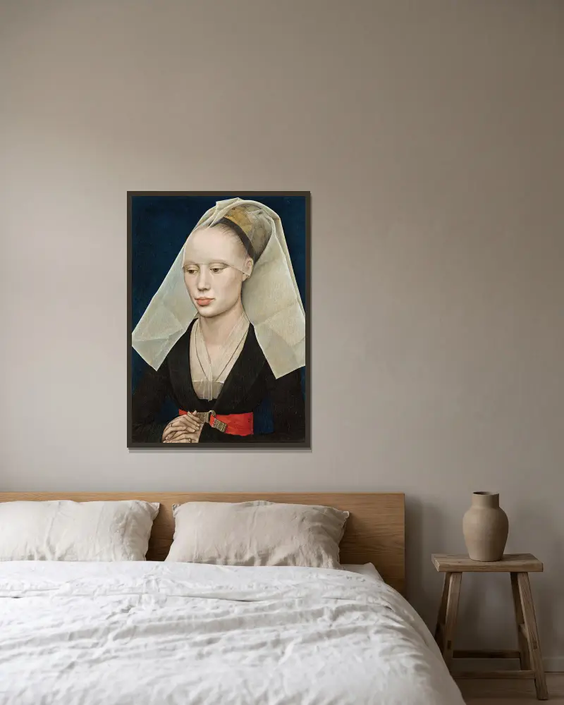 Bildnis einer Dame von Rogier van der Weyden gerahmt an einer Wand