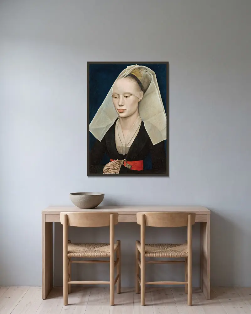 Bildnis einer Dame von Rogier van der Weyden gerahmt an einer Wand