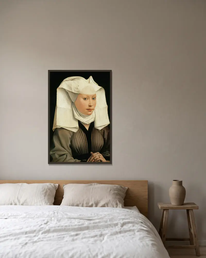 Porträtt av en kvinna av Rogier van der Weyden inramad på en vägg