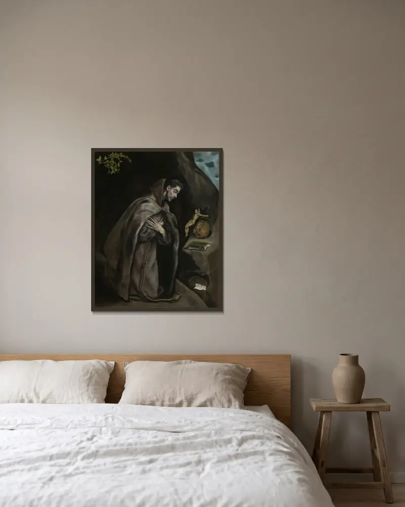 Sankt Franciskus knäböjande i meditation av El Greco (Domenikos Theotokopoulos) inramad på en vägg
