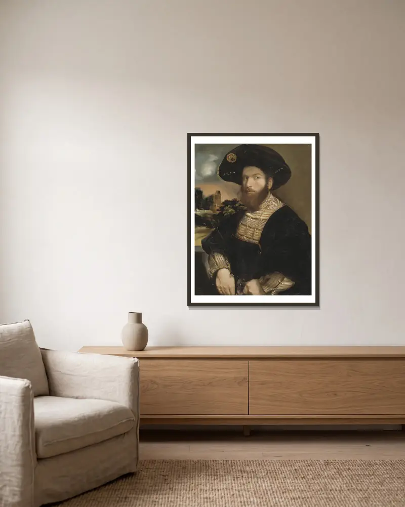 Bildnis eines Mannes mit schwarzem Barett von Dosso Dossi gerahmt an einer Wand