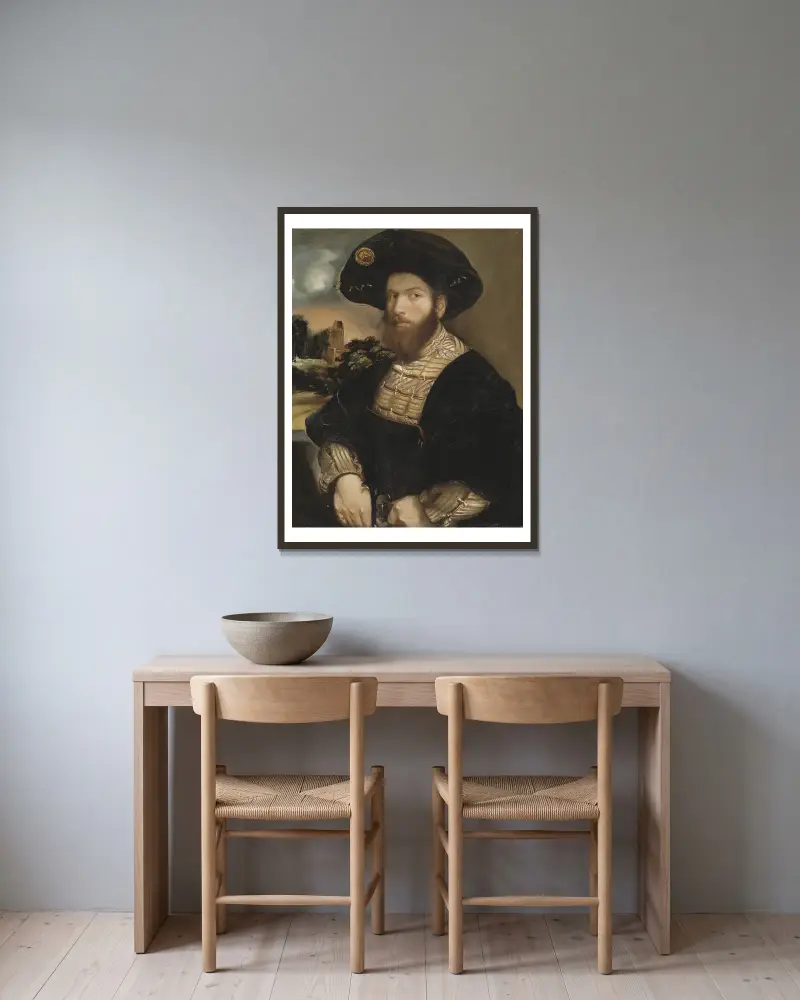 Bildnis eines Mannes mit schwarzem Barett von Dosso Dossi gerahmt an einer Wand