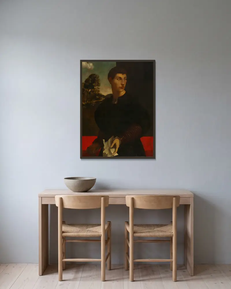 Portrait of a Young Man av Dosso Dossi inramad på en vägg