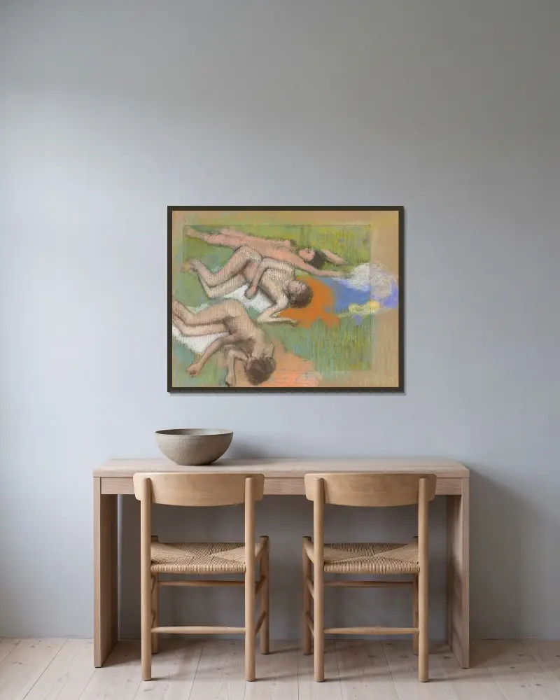 Efter badet, tre nakna kvinnor av Edgar Degas inramad på en vägg