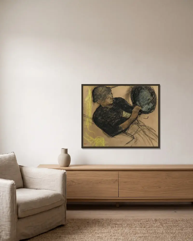 U modistky, Edgar Degas v rámu na stěně
