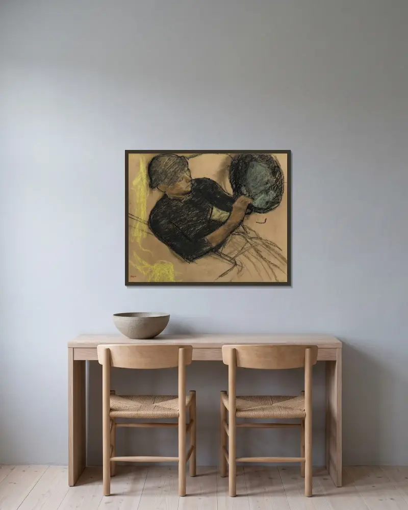 U modistky, Edgar Degas v rámu na stěně