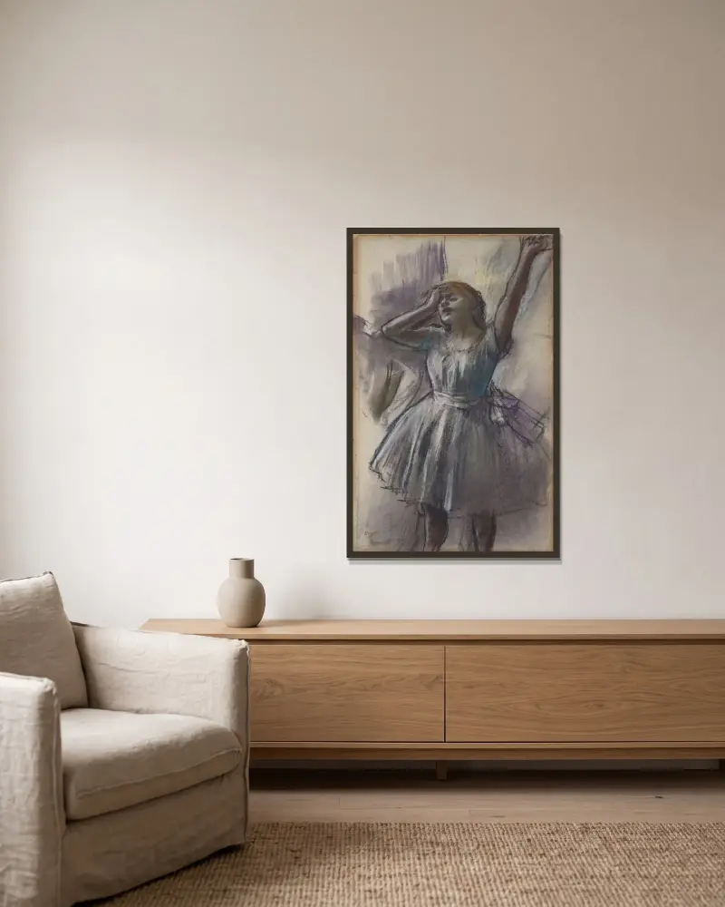 Dancer Stretching av Edgar Degas inramad på en vägg