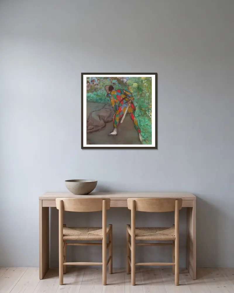 Harlequin av Edgar Degas inramad på en vägg