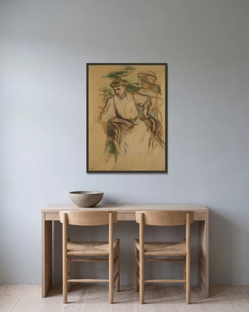 Sitzende junge Frau von Edgar Degas gerahmt an einer Wand