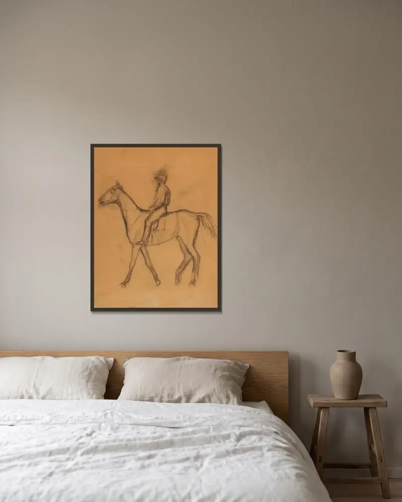 Jockey à cheval av Edgar Degas inramad på en vägg