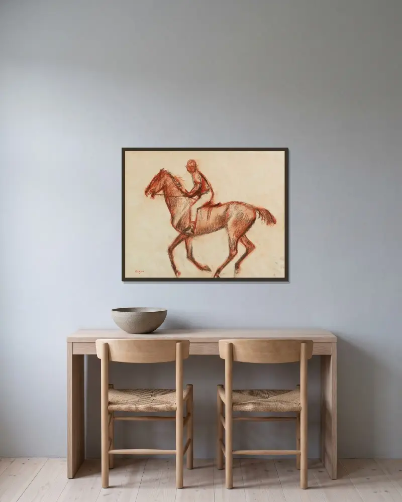 Jockey av Edgar Degas inramad på en vägg