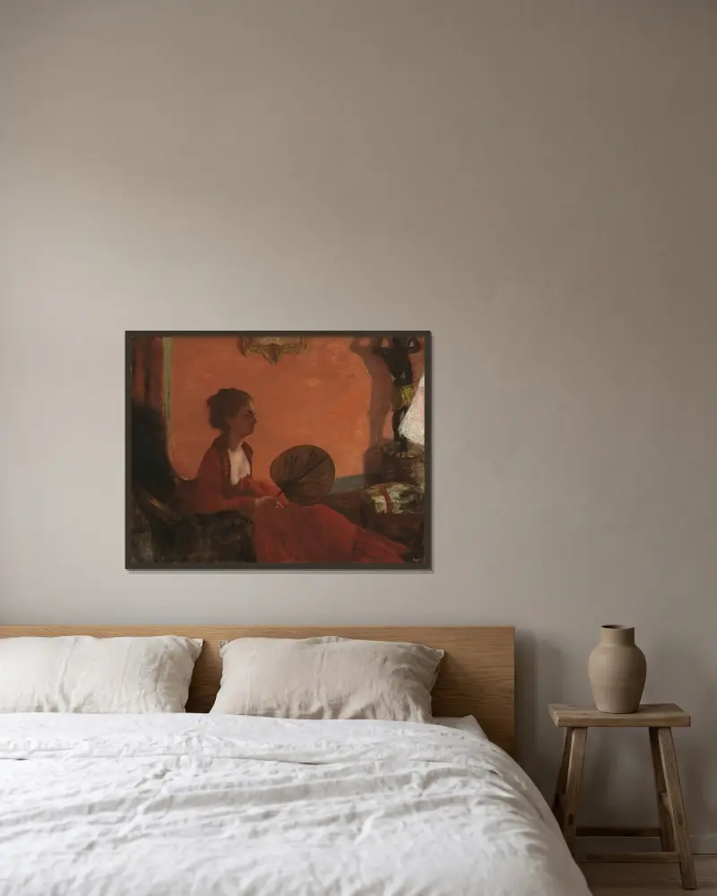 Madame Camus av Edgar Degas inramad på en vägg