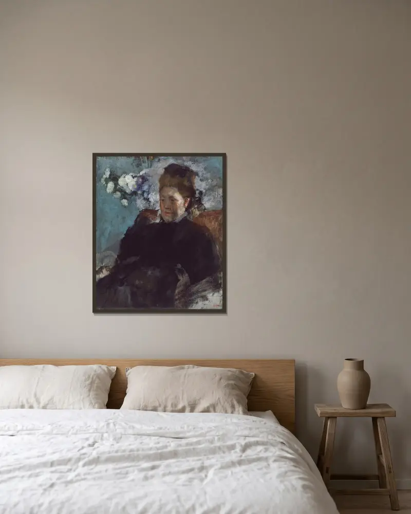 Porträtt av en kvinna av Edgar Degas inramad på en vägg