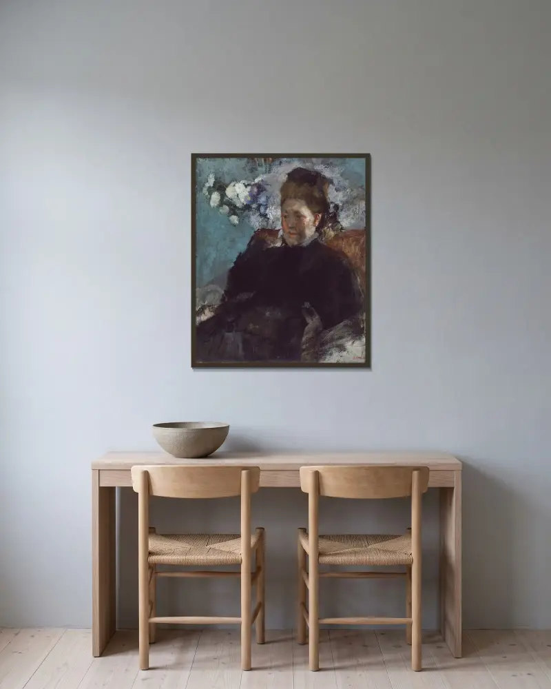 Porträtt av en kvinna av Edgar Degas inramad på en vägg