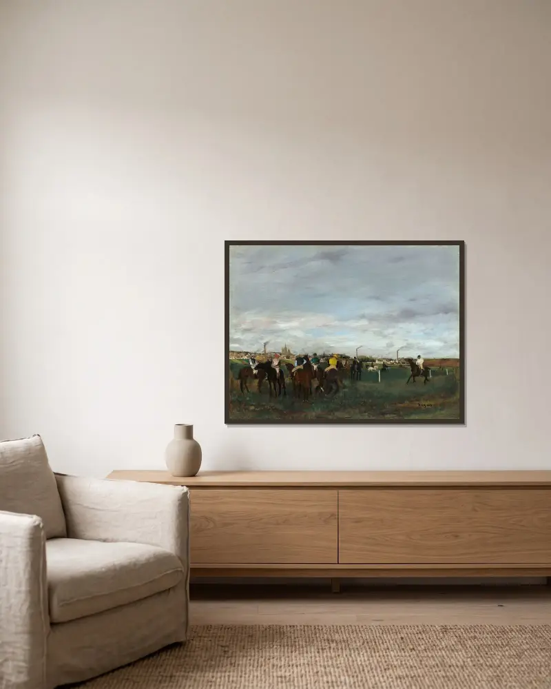 The Races av Edgar Degas inramad på en vägg