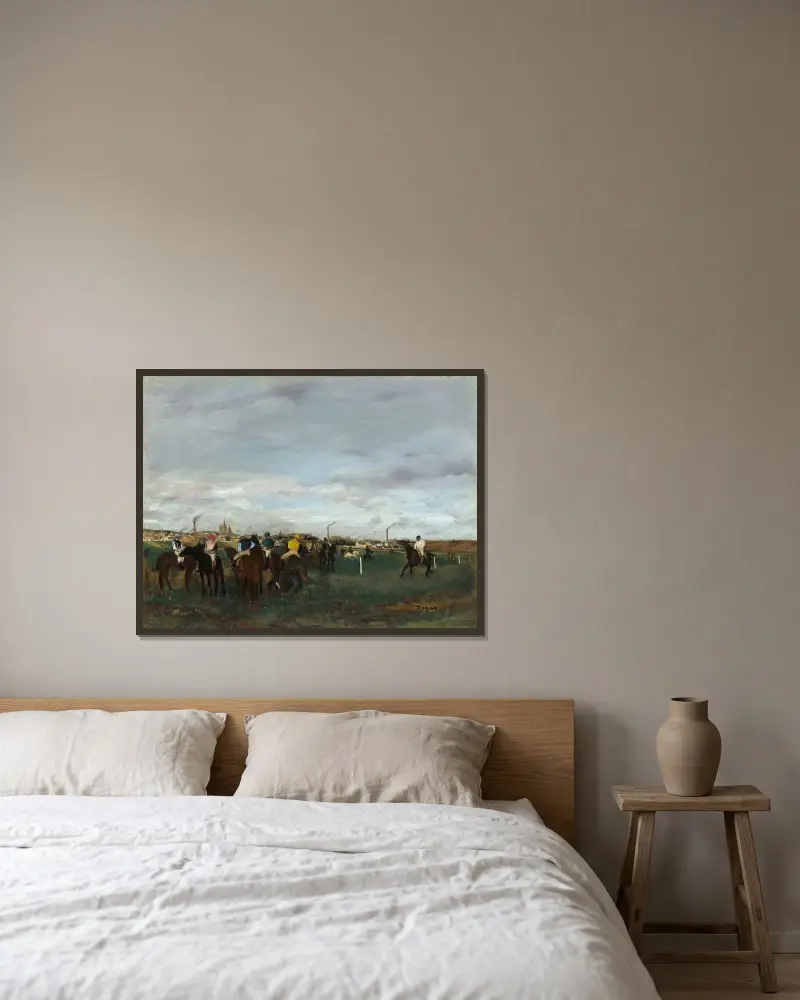 The Races av Edgar Degas inramad på en vägg