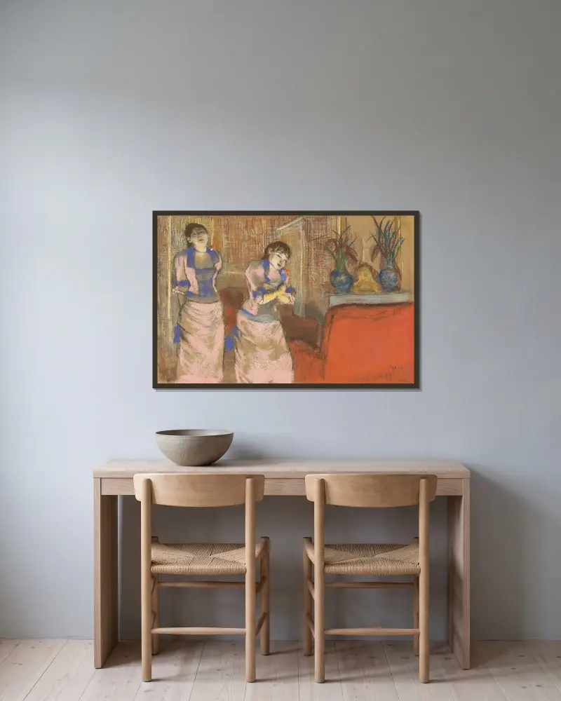 Two Women av Edgar Degas inramad på en vägg