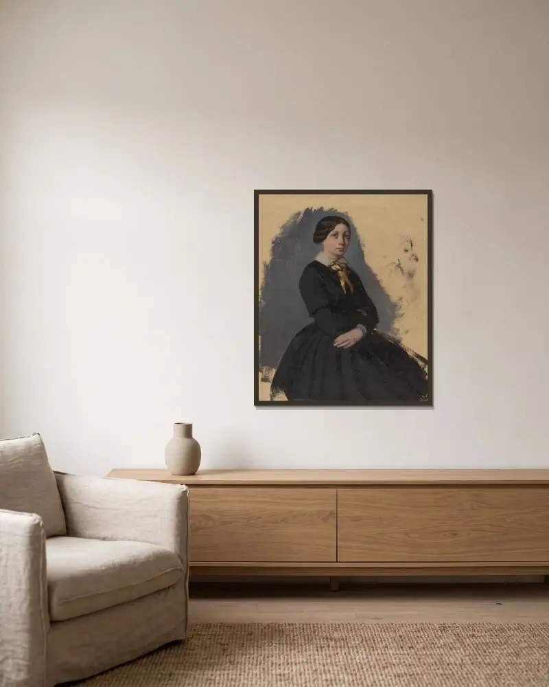Ung kvinna i svart av Edgar Degas inramad på en vägg