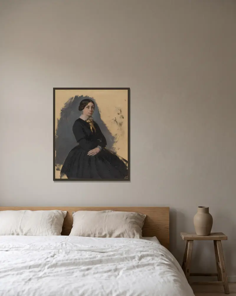 Ung kvinna i svart av Edgar Degas inramad på en vägg