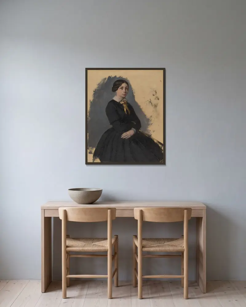 Ung kvinna i svart av Edgar Degas inramad på en vägg