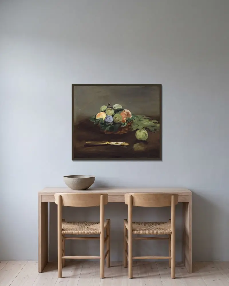 Korg med frukt av Édouard Manet inramad på en vägg