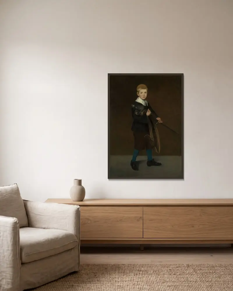 Pojke med svärd av Édouard Manet inramad på en vägg