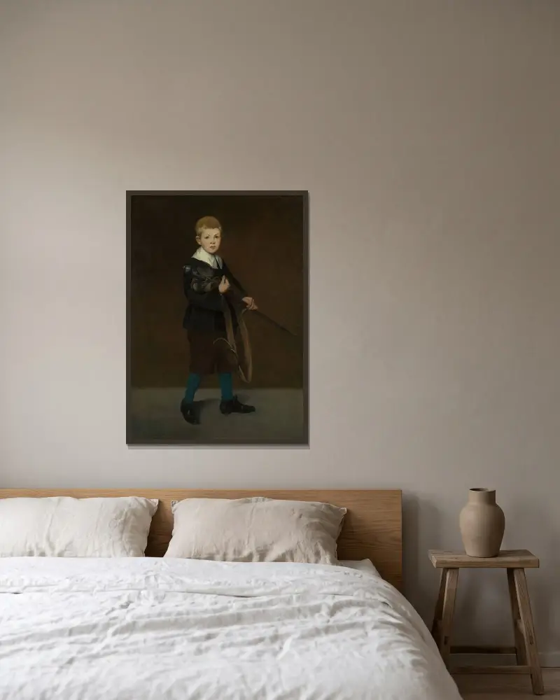 Pojke med svärd av Édouard Manet inramad på en vägg