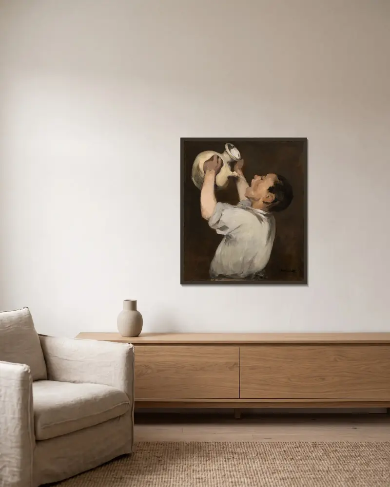 Boy with Pitcher (La Régalade) av Édouard Manet inramad på en vägg