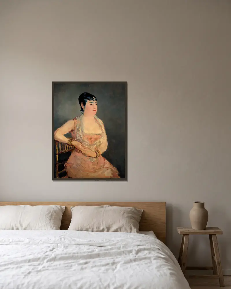 Lady In Pink av Édouard Manet inramad på en vägg