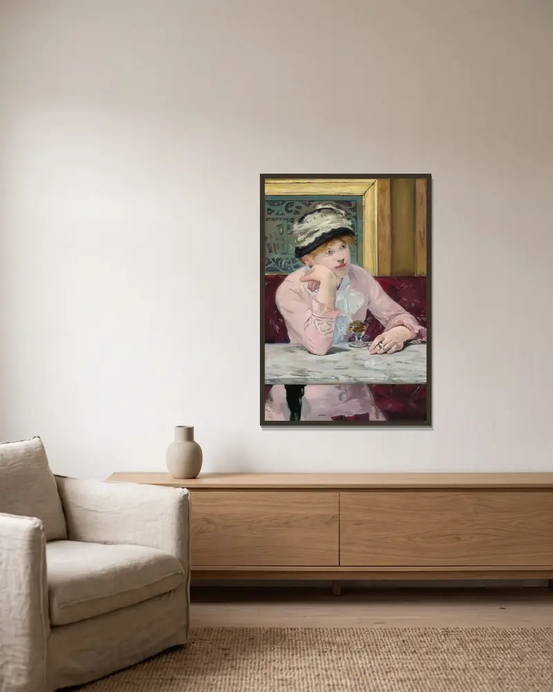 Plum Brandy av Édouard Manet inramad på en vägg
