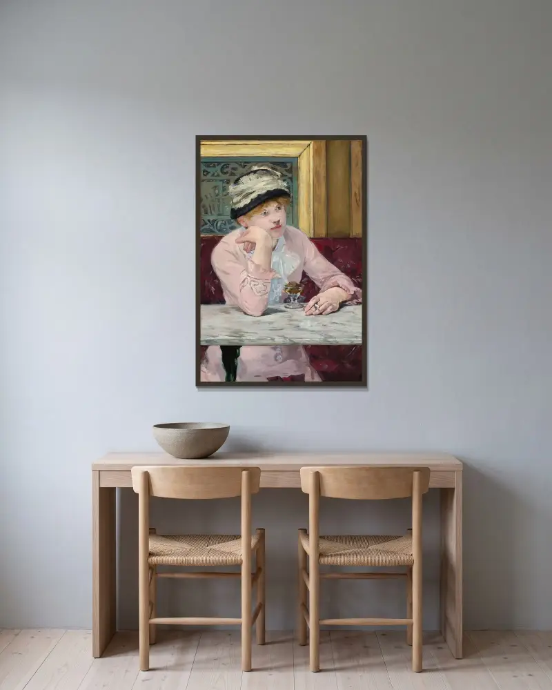 Plum Brandy av Édouard Manet inramad på en vägg