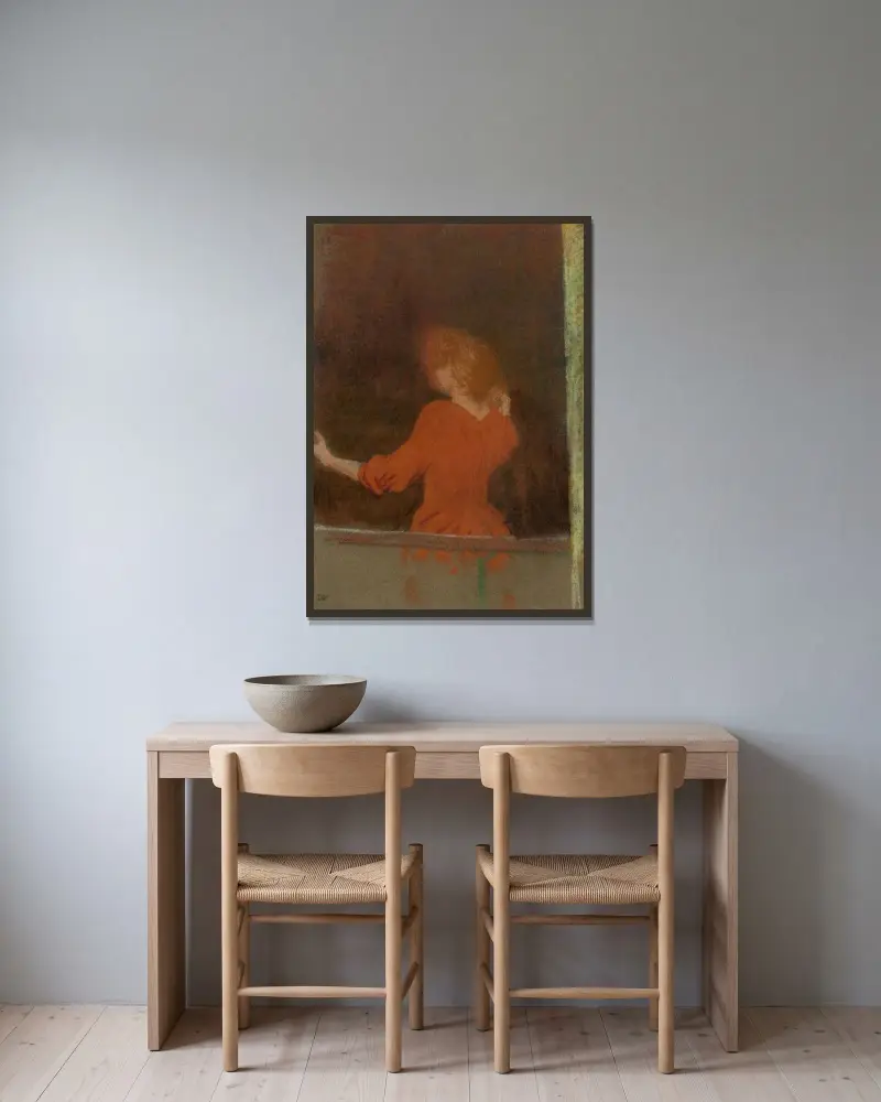 Kvinna i rött av Édouard Vuillard inramad på en vägg