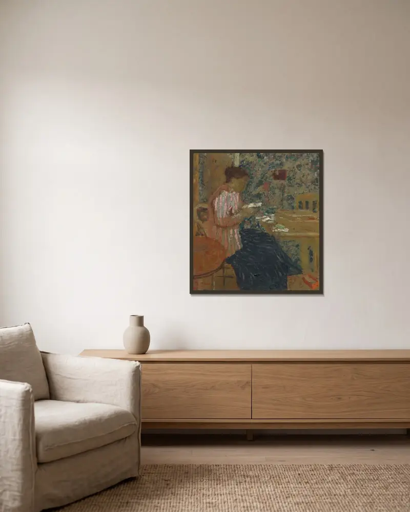 Läsande kvinna av Édouard Vuillard inramad på en vägg