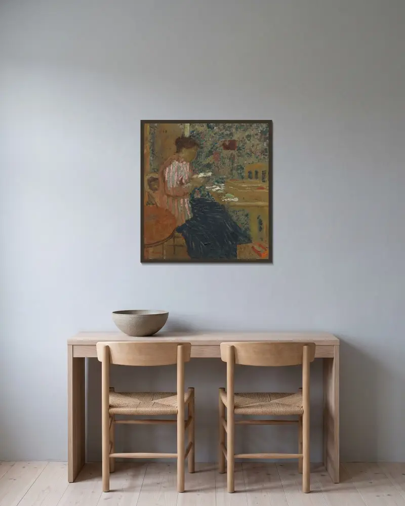 Läsande kvinna av Édouard Vuillard inramad på en vägg
