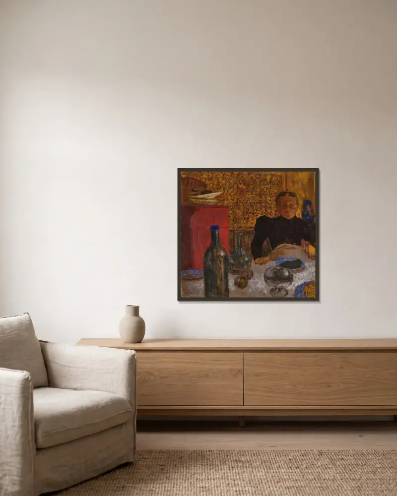 Madame Vuillard vid bordet av Édouard Vuillard inramad på en vägg