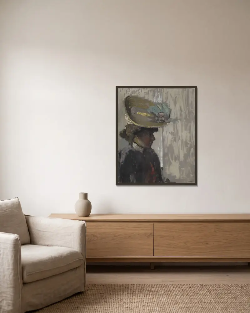 Modell med stor hatt av Édouard Vuillard inramad på en vägg