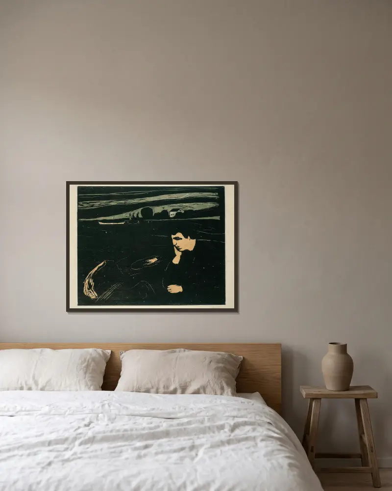 Melancholy III av Edvard Munch inramad på en vägg