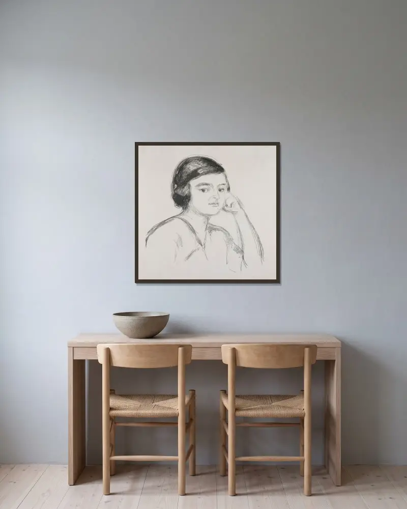 Ung kvinna med handen på kinden av Edvard Munch inramad på en vägg