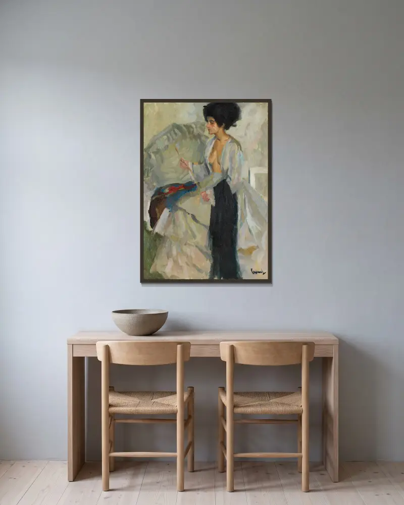 Frau im Atelier von Edward Cucuel gerahmt an einer Wand
