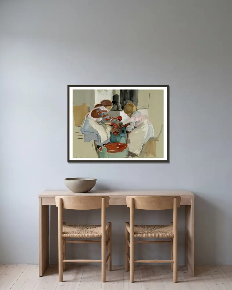Två flickor som färgar tyg av Eero Järnefelt inramad på en vägg