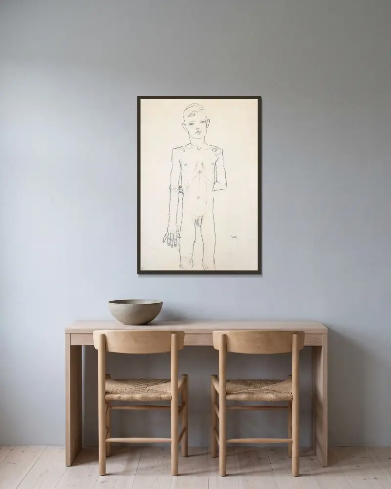 Akt eines stehenden Knaben av Egon Schiele inramad på en vägg