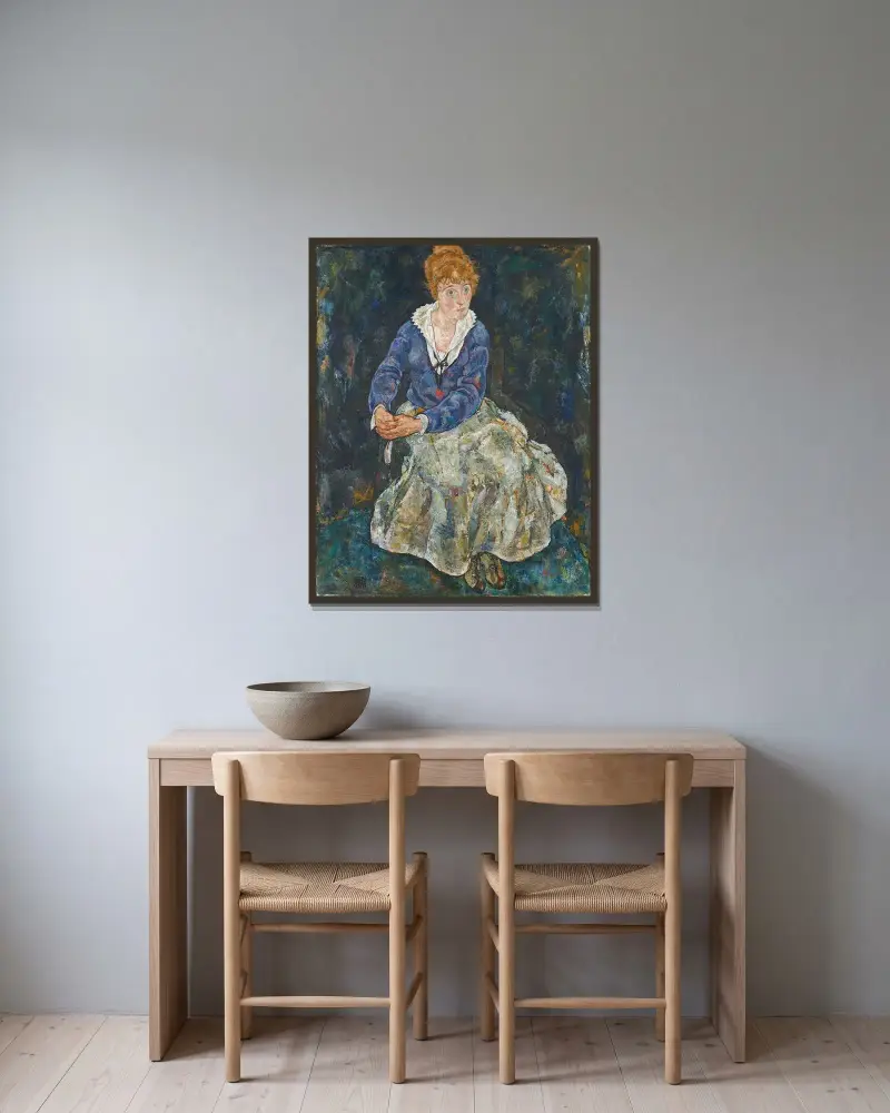 Porträtt av konstnärens hustru, Edith Schiele av Egon Schiele inramad på en vägg