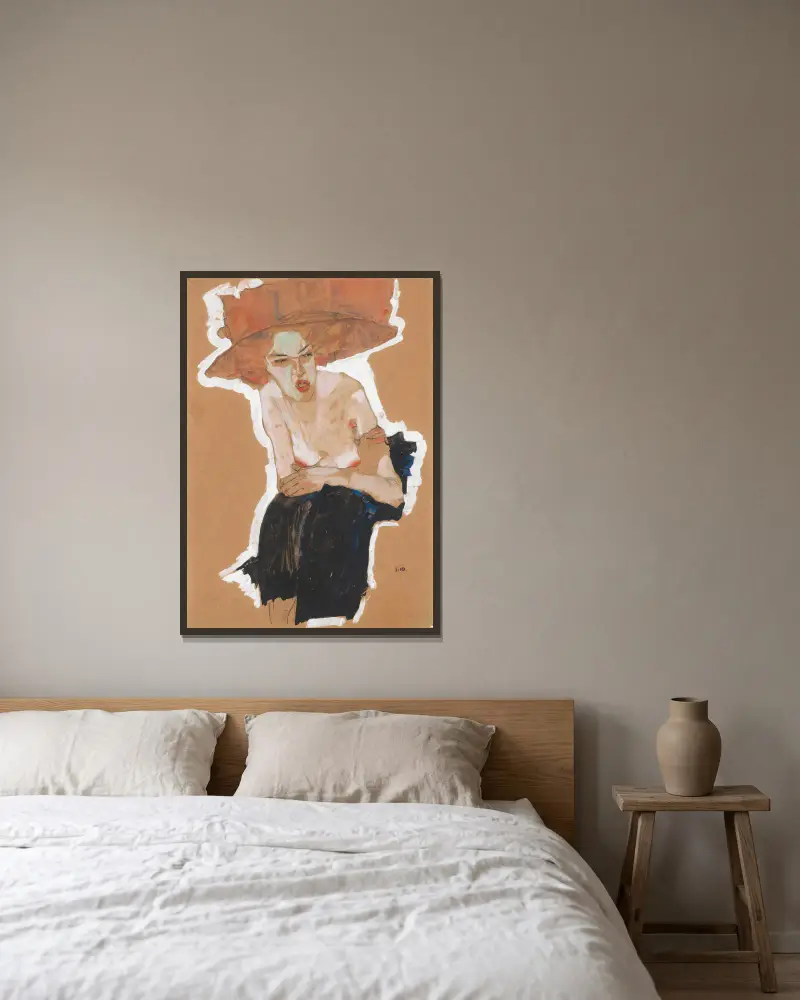 Die Hämische av Egon Schiele inramad på en vägg