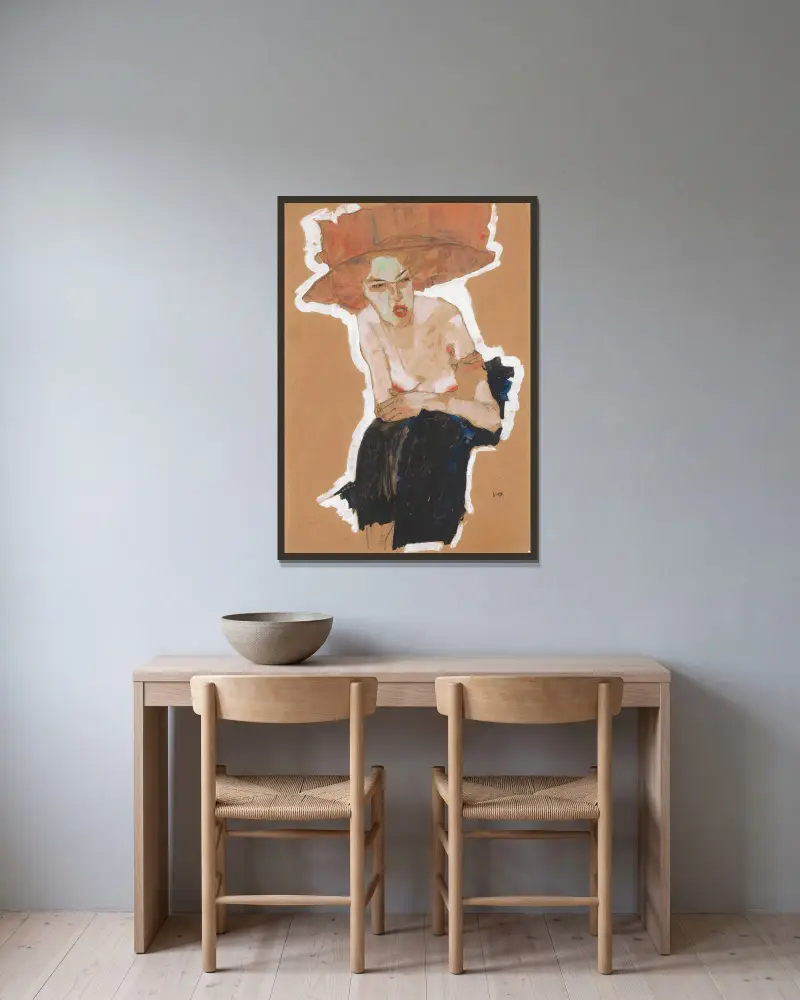 Die Hämische av Egon Schiele inramad på en vägg